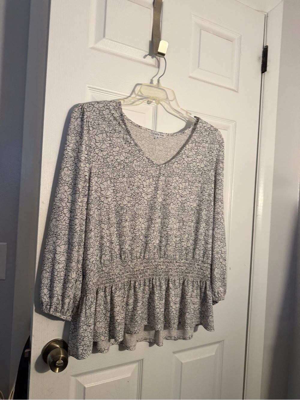 Ophelia Roe V Neck Long Sleeve Ruffle Hem Top in white and black Floral